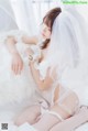 Coser @ 桜 桃 喵 Vol.040: 轻纱 02 (34 photos) P16 No.8bf562 Image No. 37